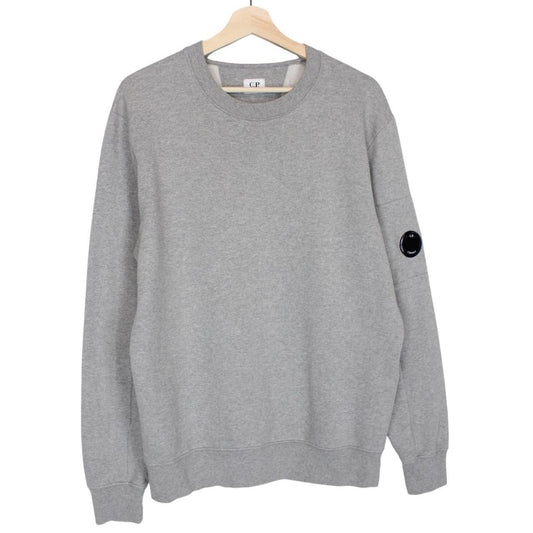 CP Company grey sweatshirt with lens detail and cotton material.
