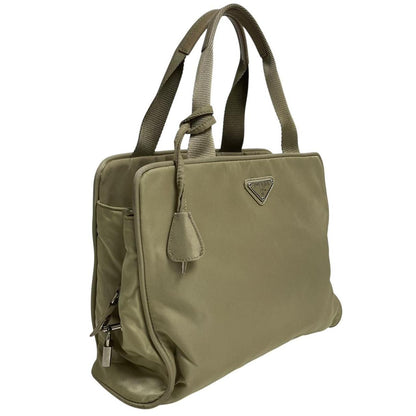 Prada green nylon duffel bag with logo detail and working lock and key.