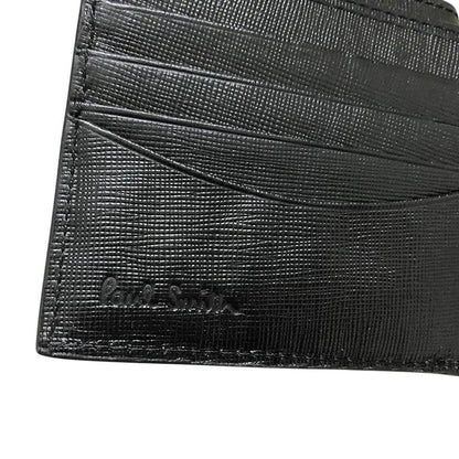 Paul Smith black bifold wallet textured crosshatch leather with logo detail.