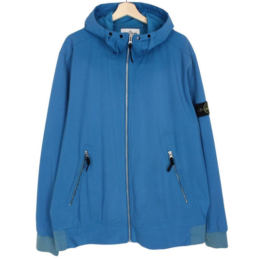 Stone Island blue full zip jacket with logo patch and soft shell material.