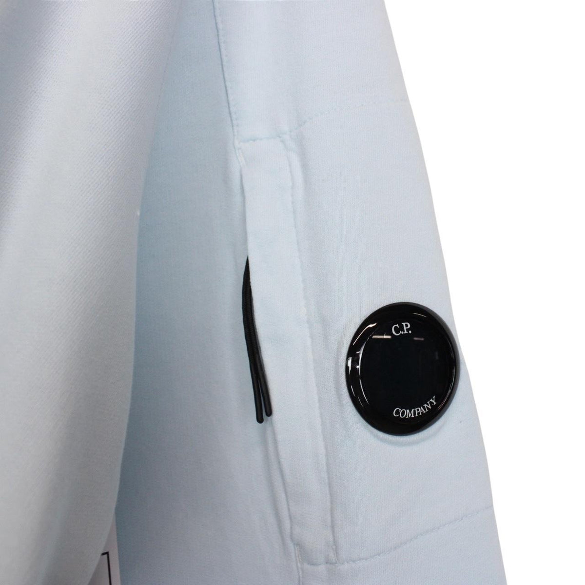 CP Company light blue sweatshirt with signature lens detail and cotton fabric.