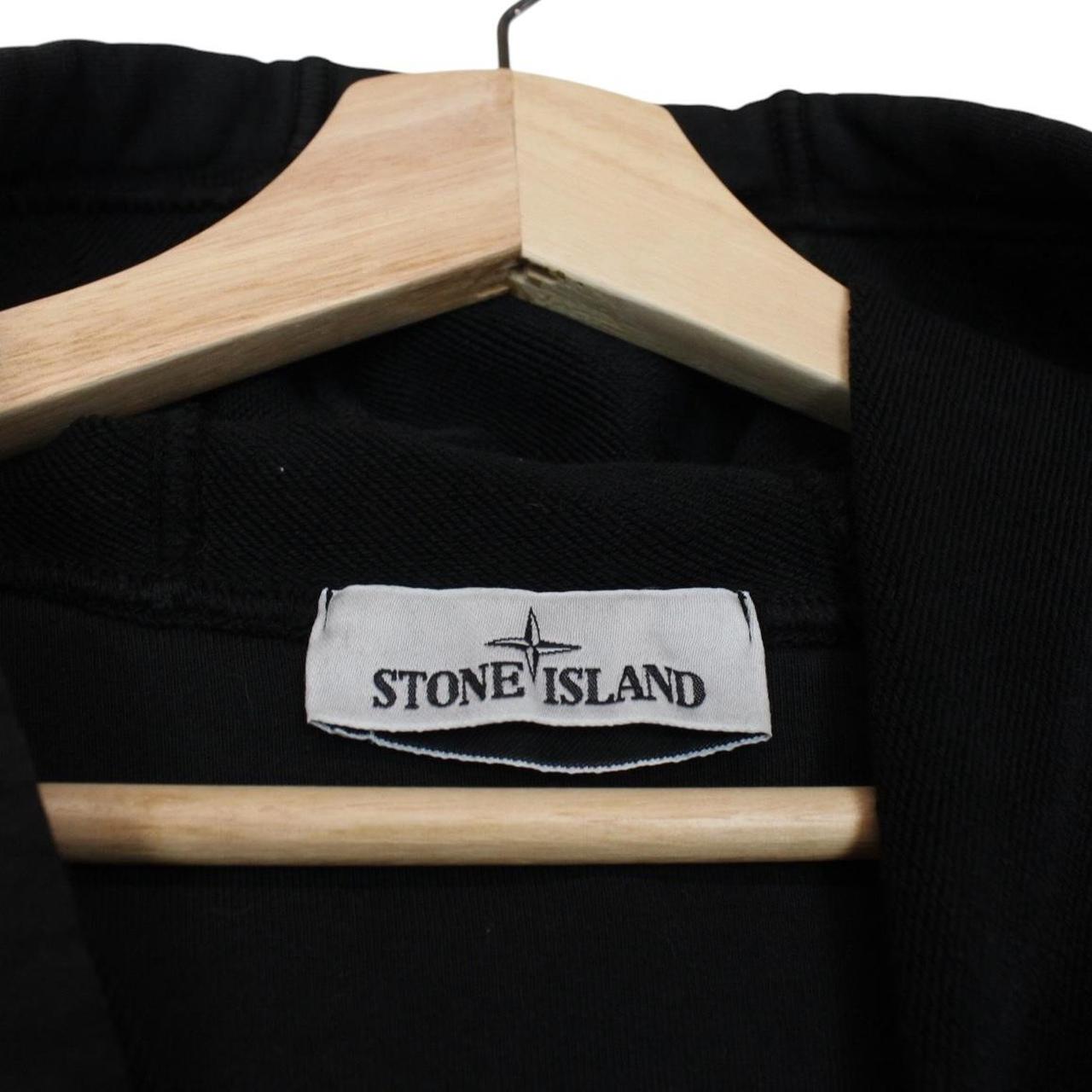 Stone Island black hoodie jumper with embroidered compass logo and cotton material.