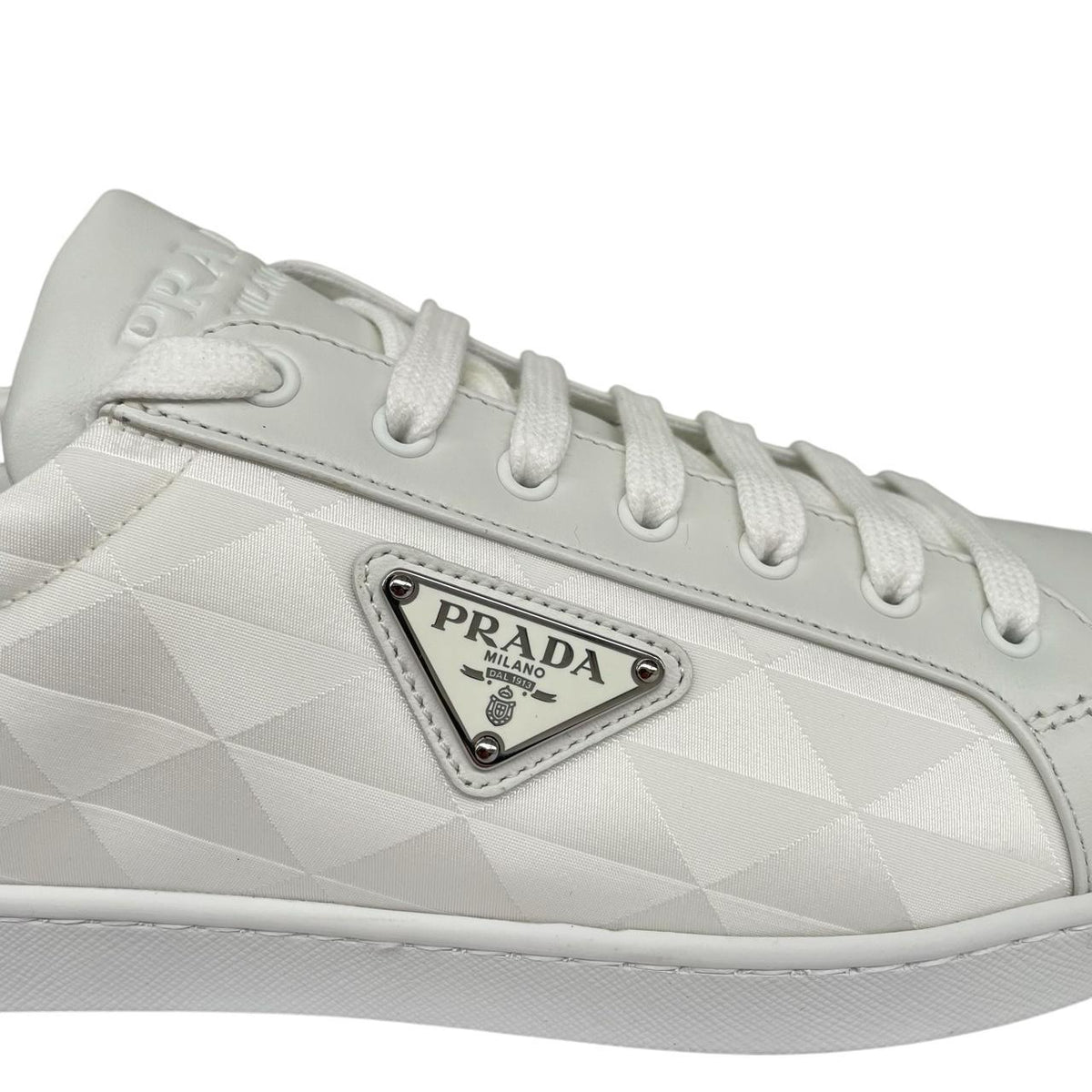 Prada white trainers Re-Nylon and brushed leather with logo detail and dust bags.