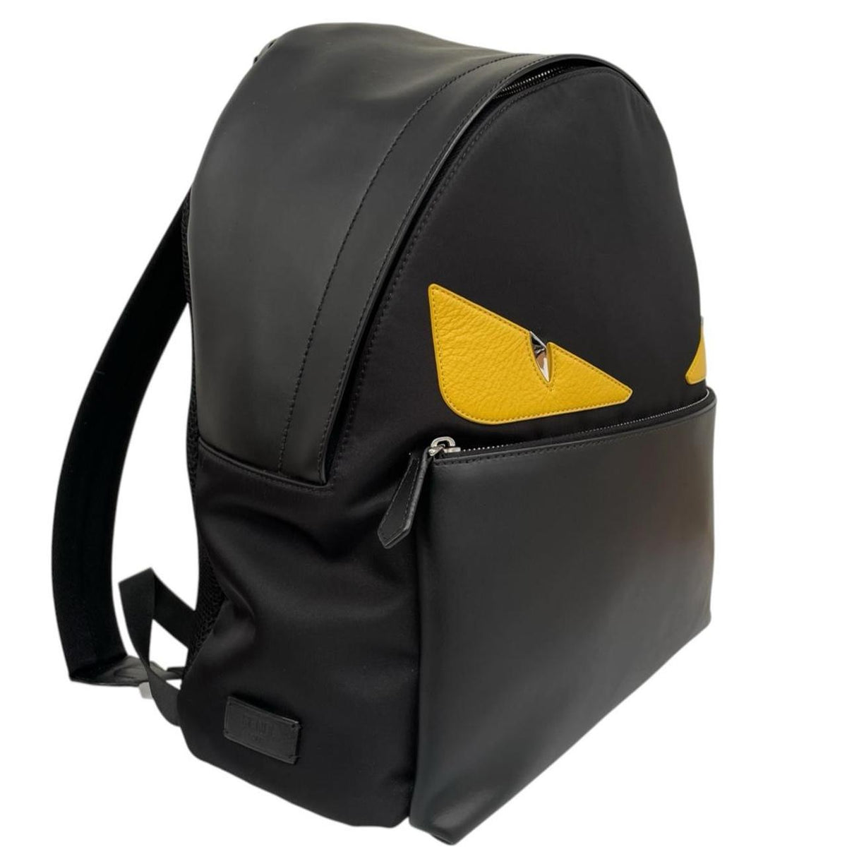 Fendi black and yellow nylon/leather backpack with monster bug eyes design.