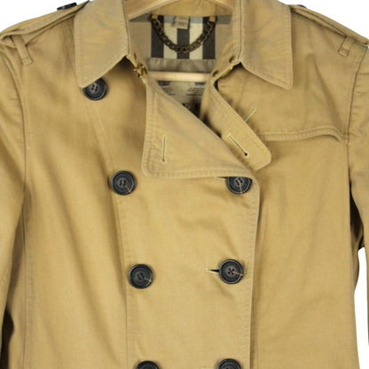 Burberry tan brown trench coat with Nova Check pattern and double-breasted design.