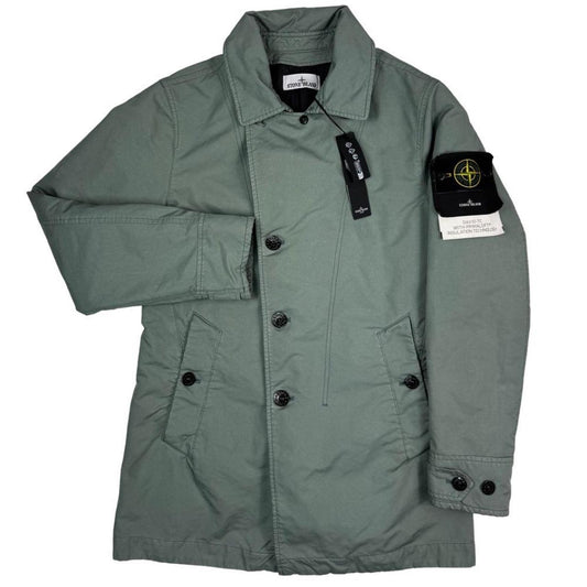Stone Island green jacket with Primaloft insulation and iconic compass logo.