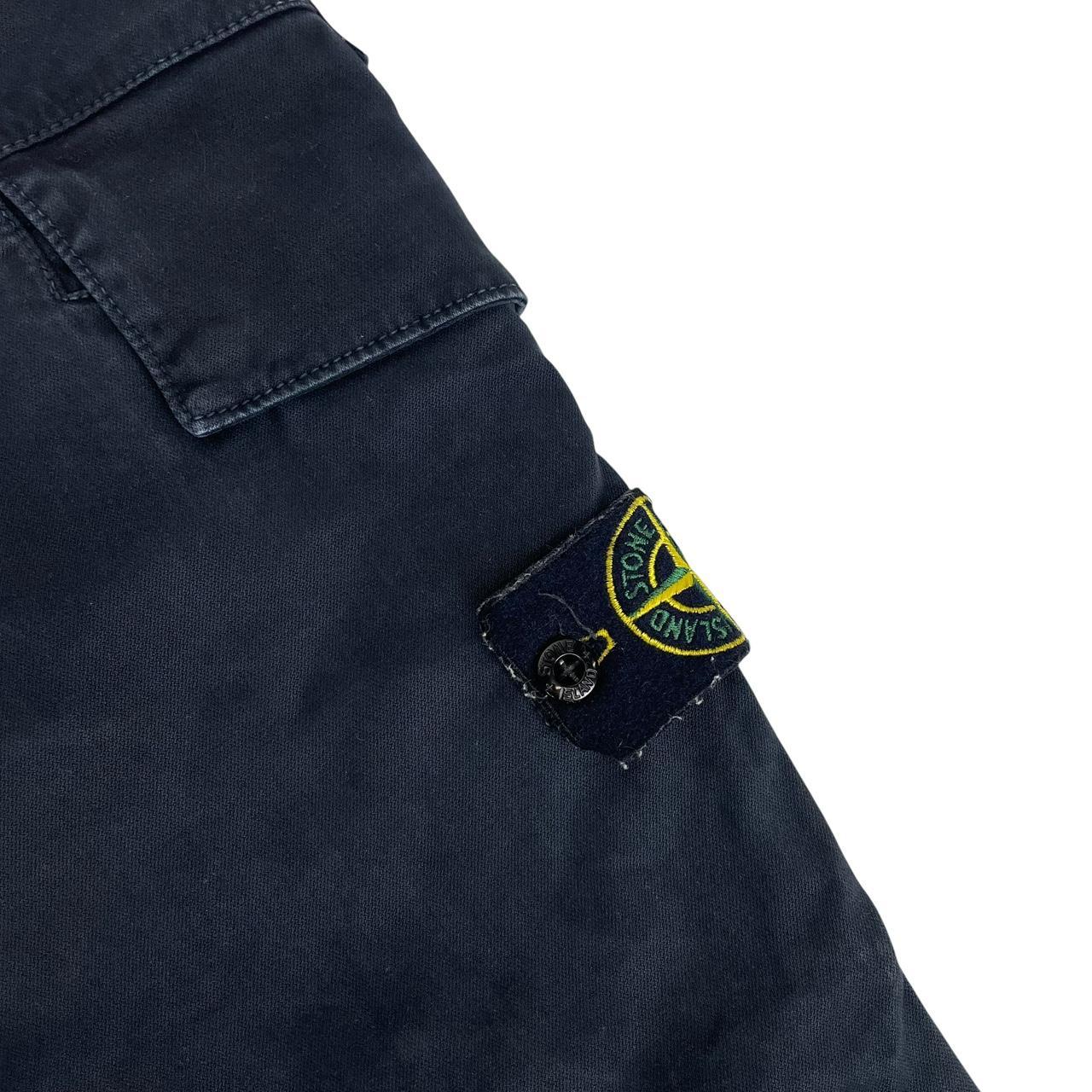 Stone Island navy blue skinny fit cargo trousers with logo patch and pockets.