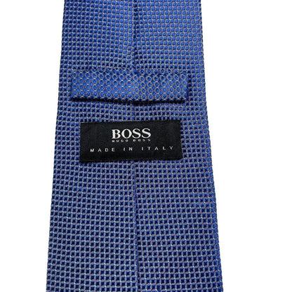 Hugo Boss blue silk tie with smooth texture and subtle sheen.