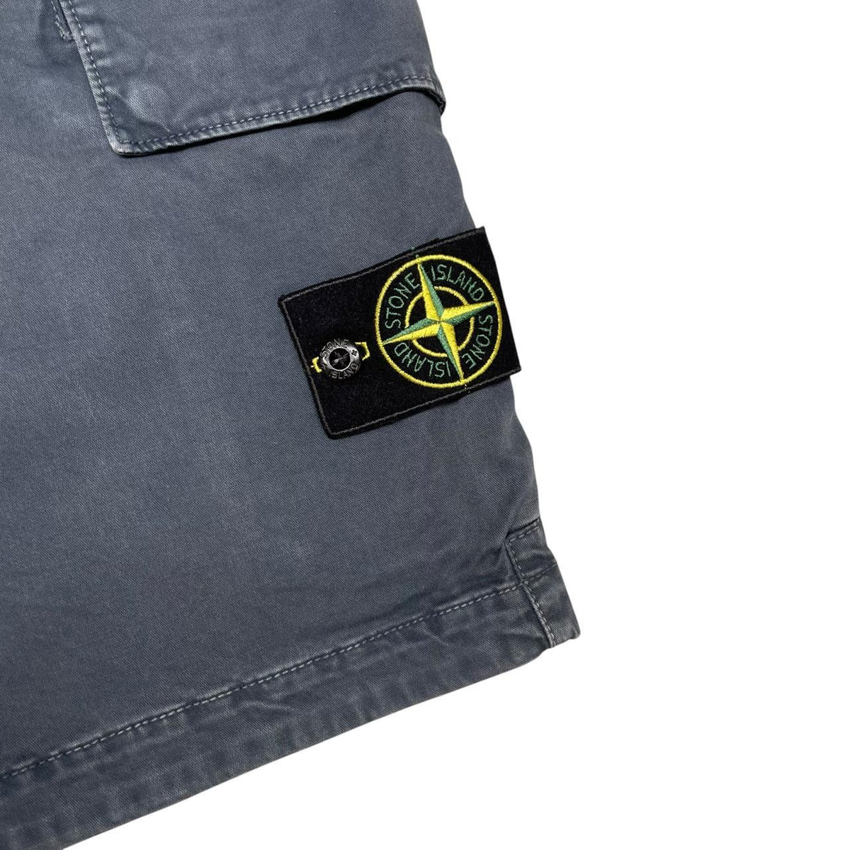 Stone Island navy blue cargo shorts with logo patch and cotton fabric.