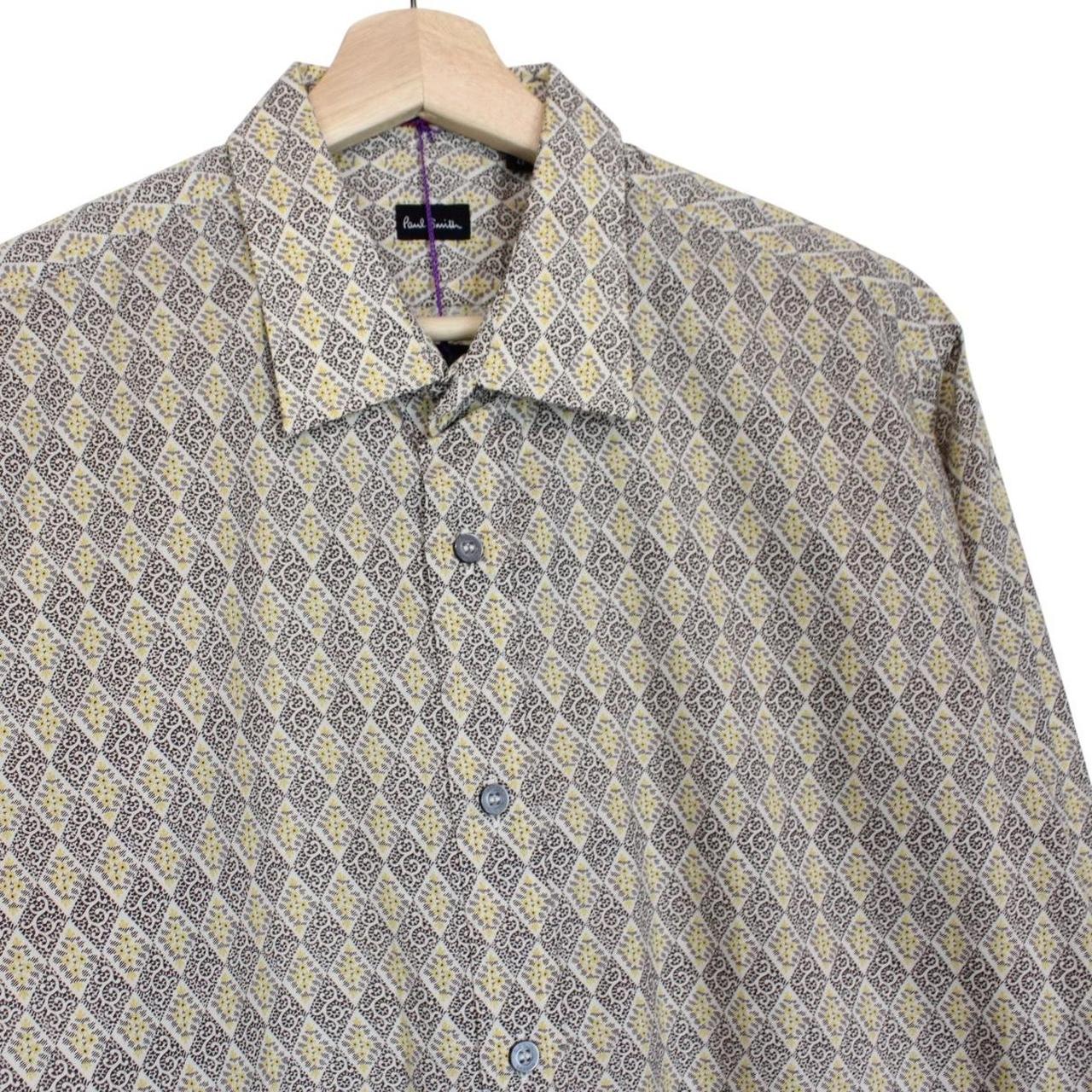 Paul Smith cream formal shirt with multicoloured abstract pattern and long sleeves.