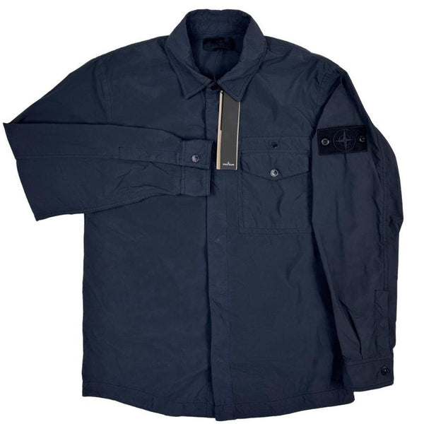 Stone Island navy blue nylon overshirt jacket with ghost logo and smooth texture.
