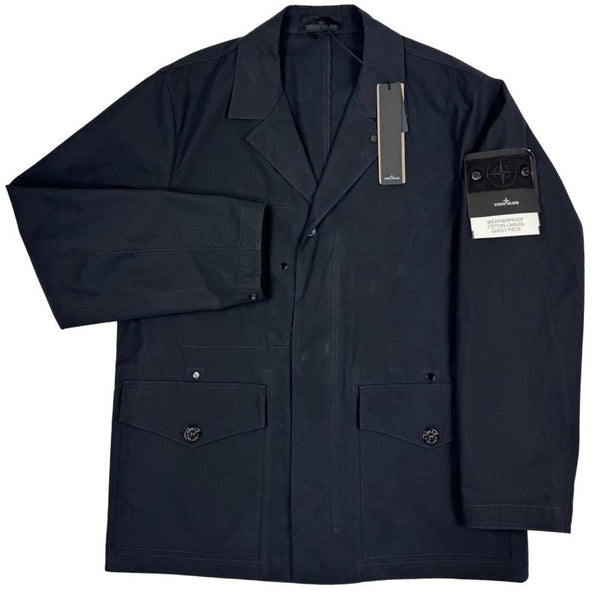 Stone Island navy blue jacket weatherproof cotton canvas with ghost logo detail.