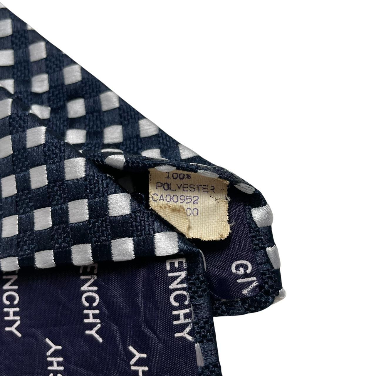 Givenchy navy blue and white polyester tie with logo pattern and excellent condition.
