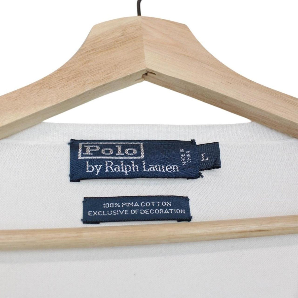 Polo Ralph Lauren white knit v-neck jumper with embroidered logo and pima cotton material.