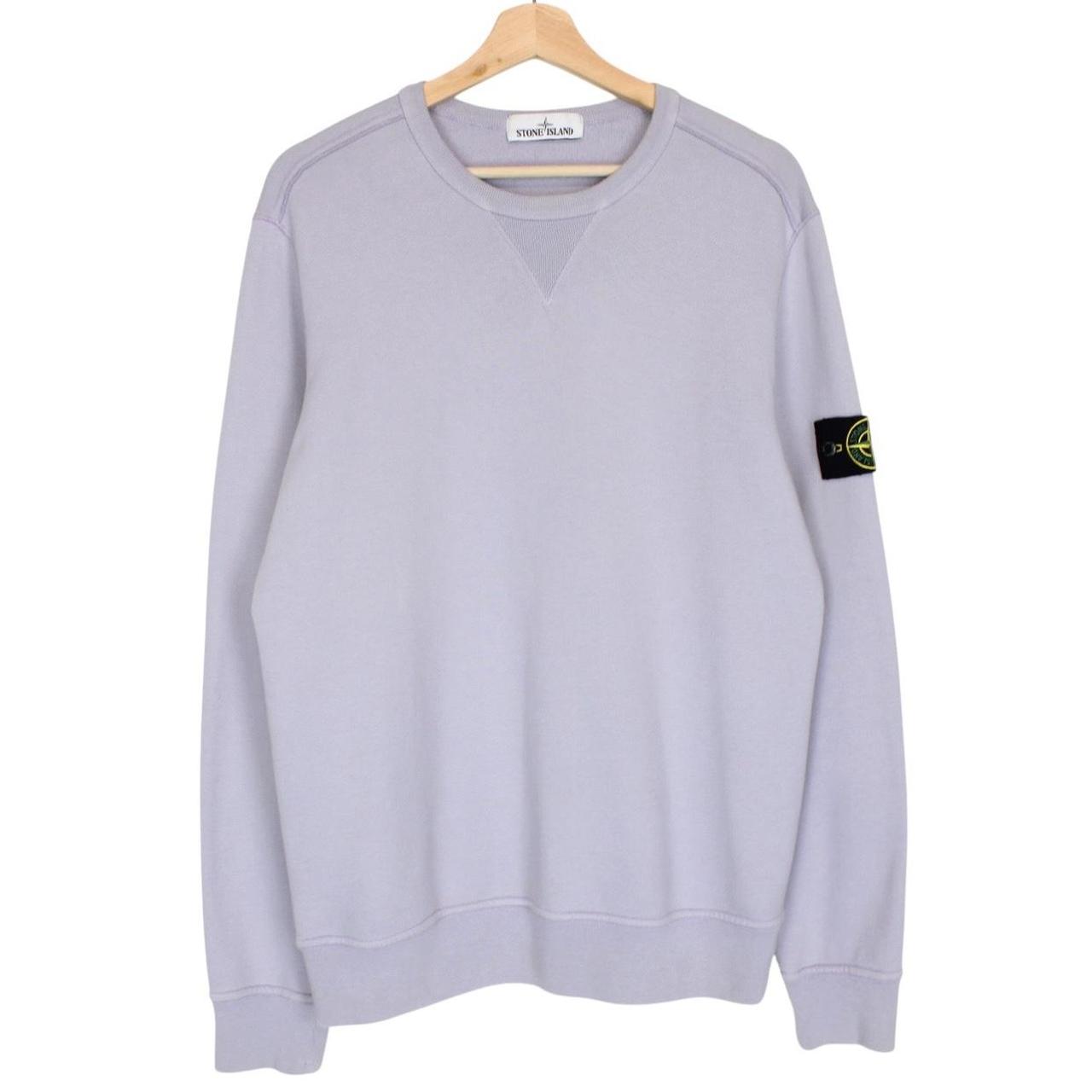 Stone Island lilac purple sweatshirt with compass logo patch and cotton material.