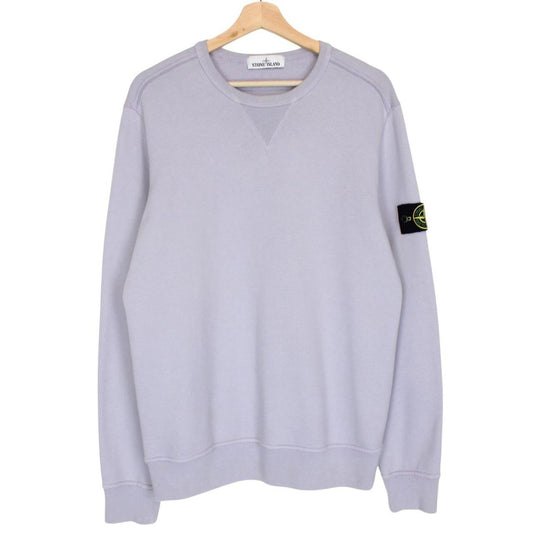 Stone Island lilac purple sweatshirt with compass logo patch and cotton material.