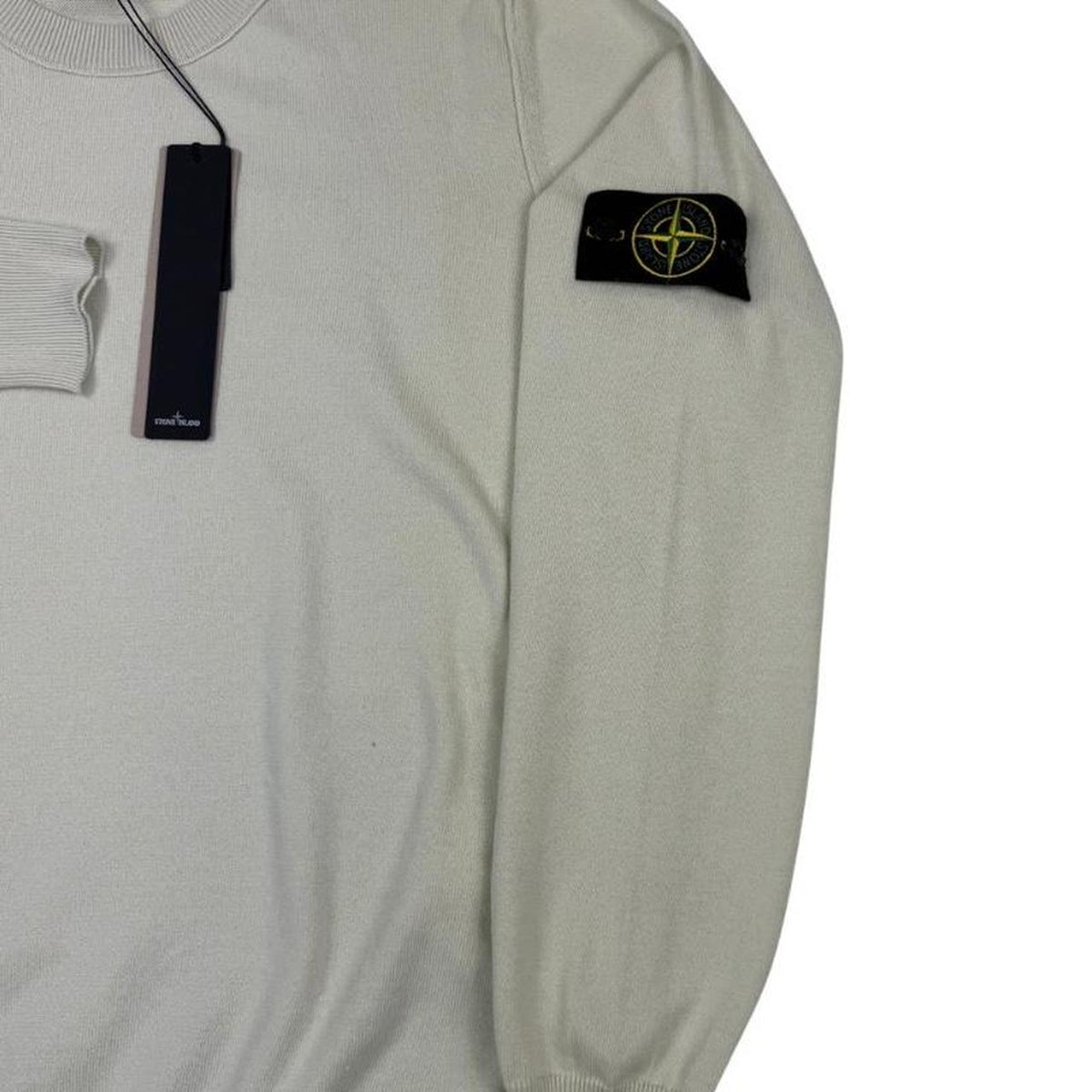 Stone Island beige knit jumper made from organic cotton with logo badge detail.