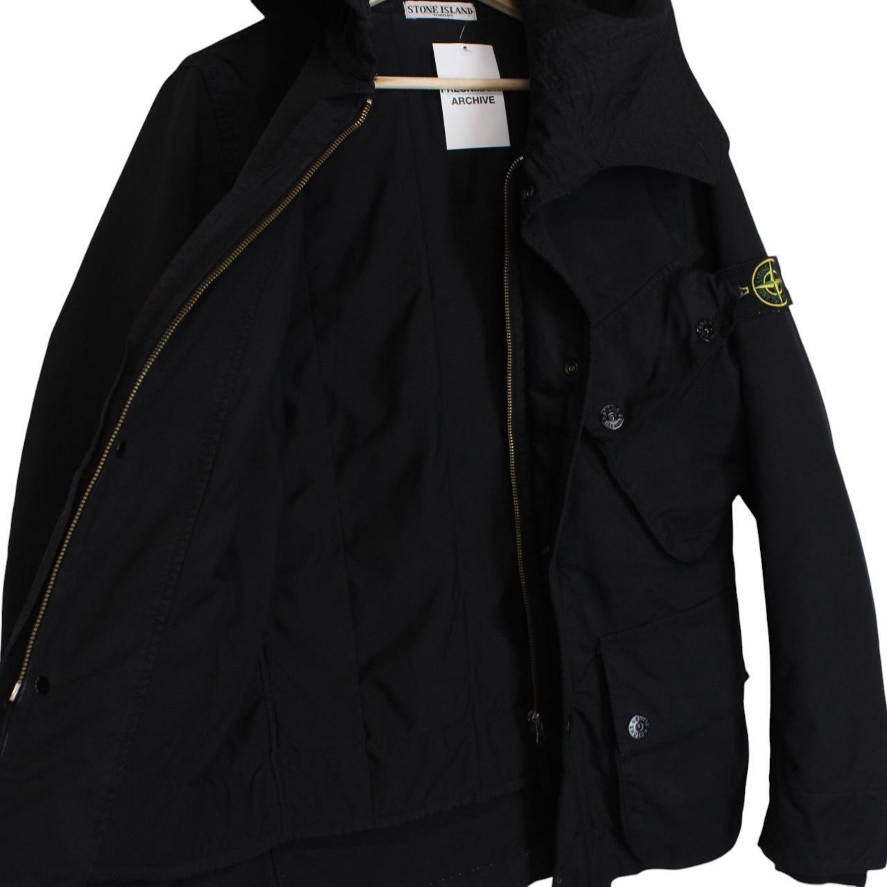 Stone Island black full zip jacket with multi pockets and compass logo detail.