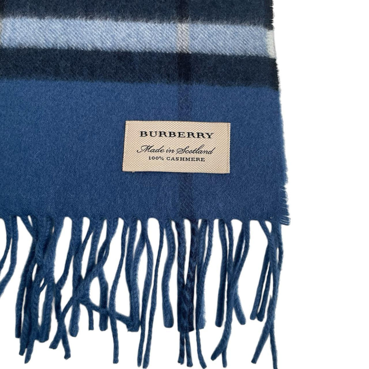 Burberry blue cashmere scarf featuring iconic Nova Check pattern and logo.