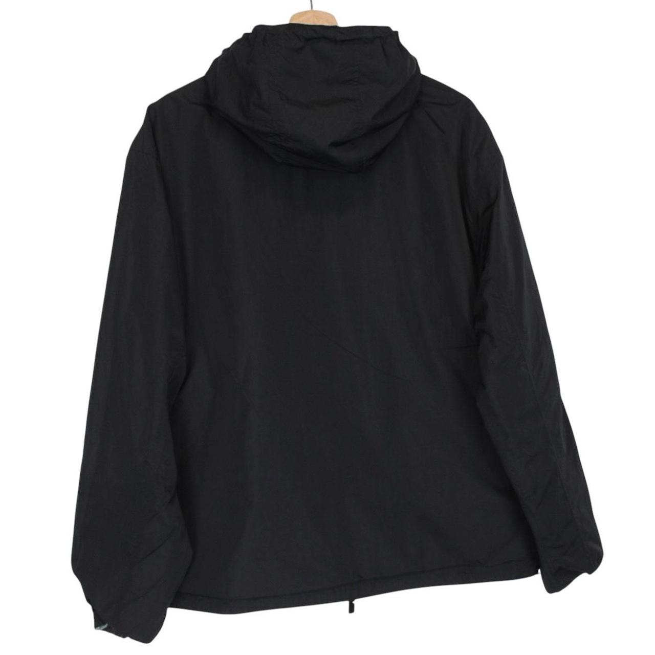 Burberry reversible jacket in dark grey and black with Nova Check pattern and full zip.