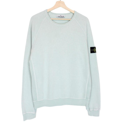 Stone Island mint green cotton sweatshirt with logo patch and ribbed cuffs.