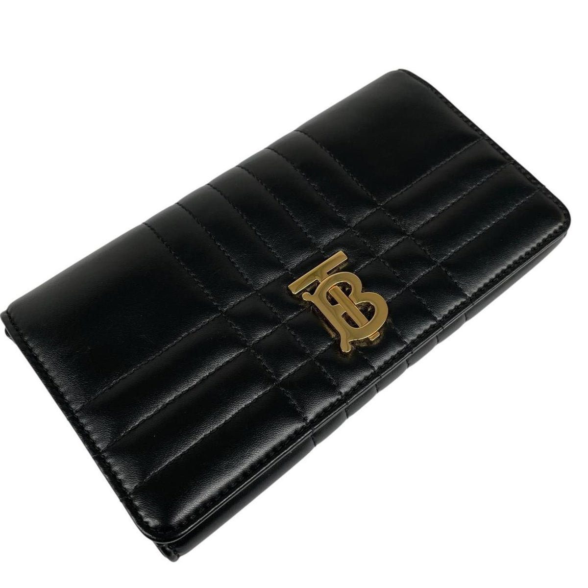 Burberry black and gold quilted leather small Lola shoulder bag with logo detail.
