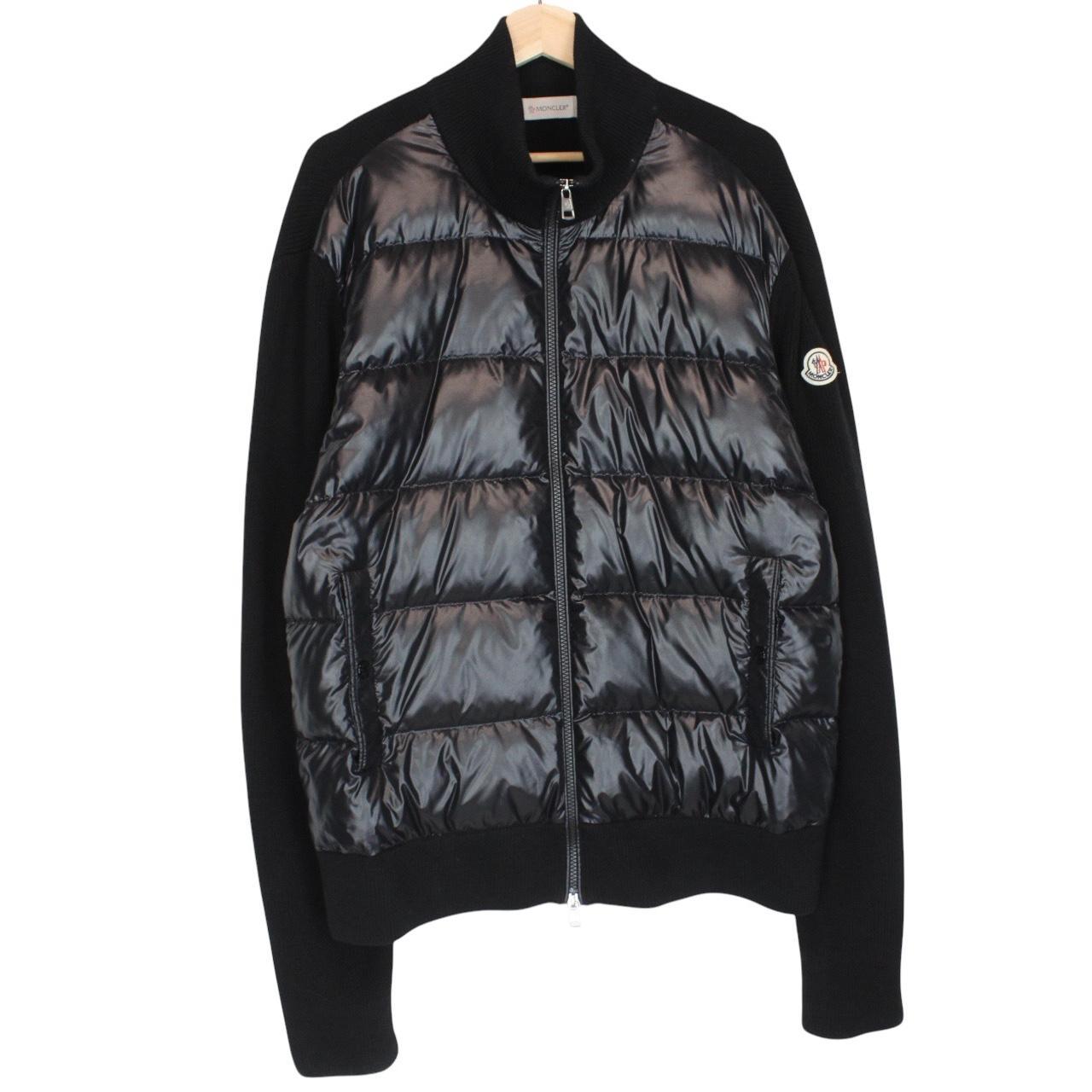 Moncler black cardigan jacket with full zip, wool/nylon blend, and logo detail.