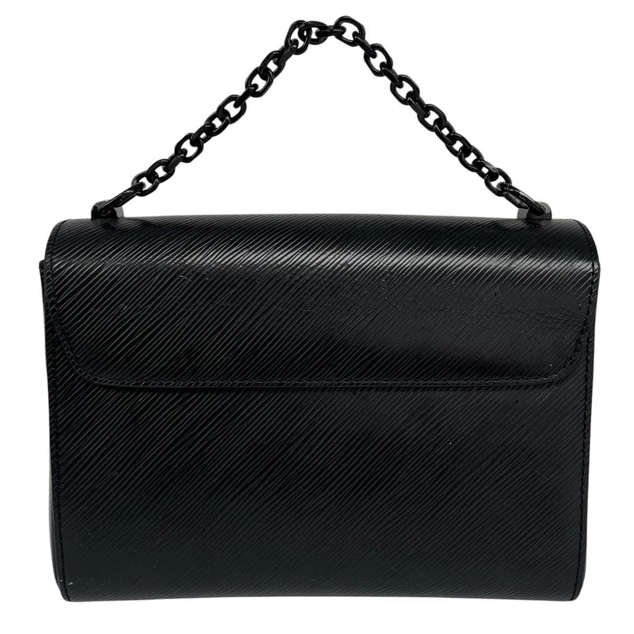Louis Vuitton black Epi leather duffel bag with twist lock and visible wear.
