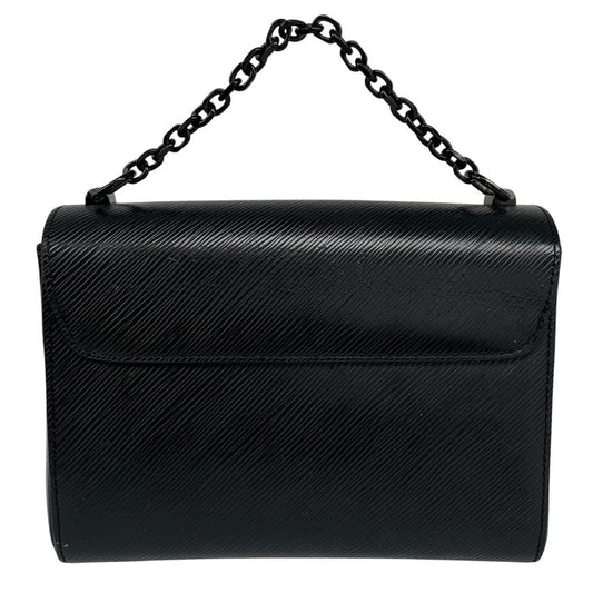 Louis Vuitton black Epi leather duffel bag with twist lock and visible wear.