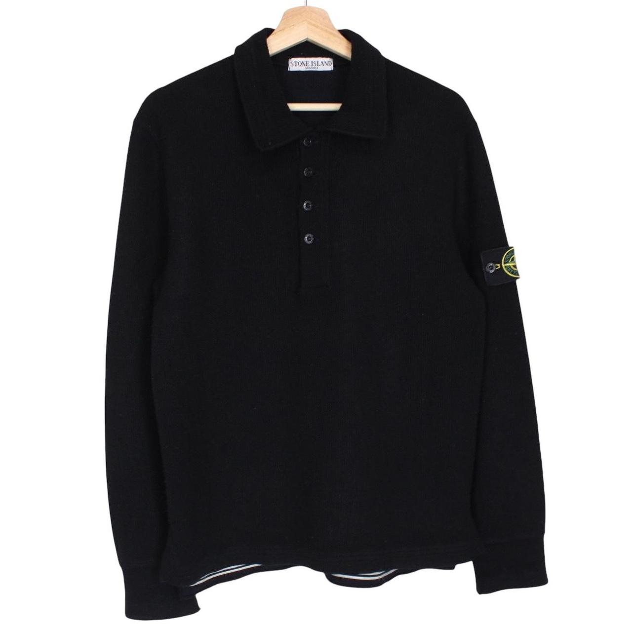 Stone Island black wool knit jumper with iconic compass logo and vintage design.
