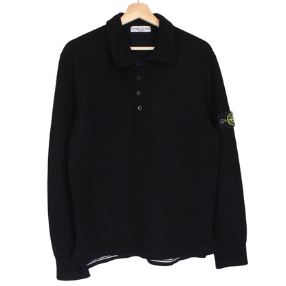 Stone Island black wool knit jumper with iconic compass logo and vintage design.