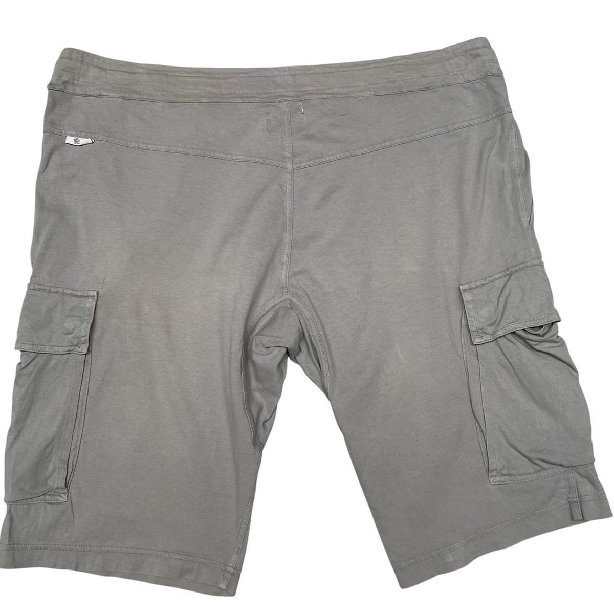 Moncler grey jogger shorts cotton material with logo detail and minor marks.
