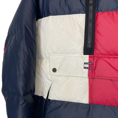 Tommy Hilfiger navy blue pullover jacket with 1/4 zip and hood, nylon material.