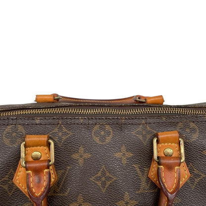 Louis Vuitton beige and brown monogram coated canvas shopping tote with padlock detail.