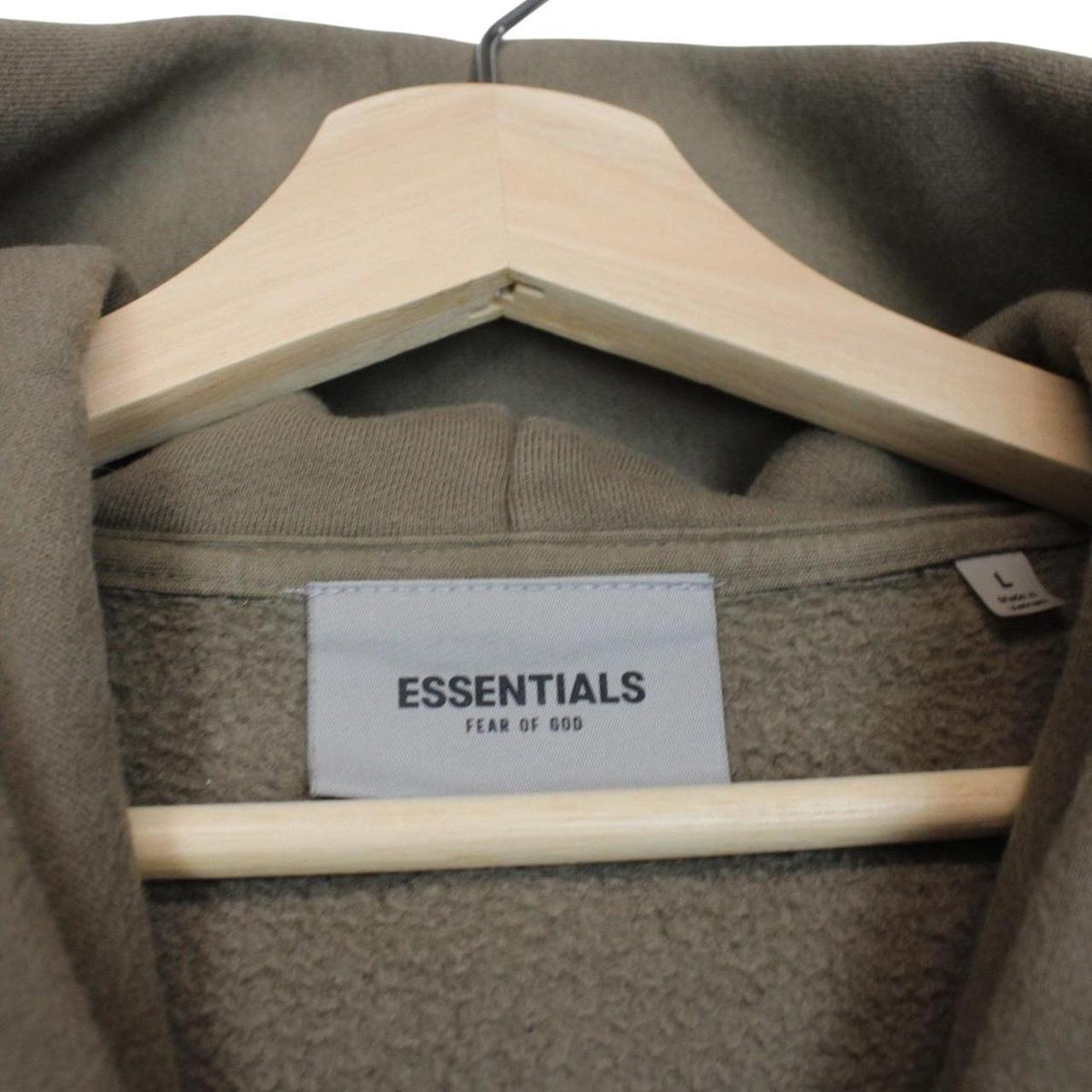 Essentials brown hoodie jumper with logo, oversized fit, soft cotton material.