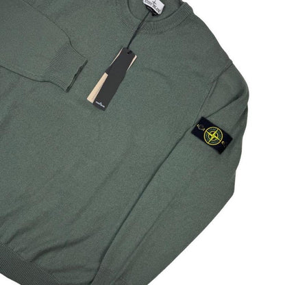 Stone Island green knit jumper made from organic cotton with logo patch detail.