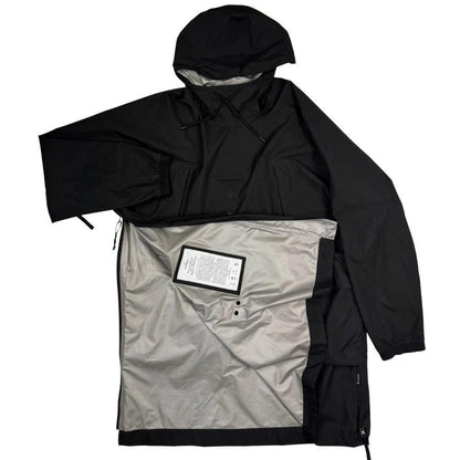 Stone Island black quilted gilet with Gore-Tex logo and ripstop material.