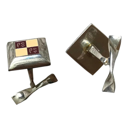 Paul Smith silver cufflinks with beveled edge and engraved "PS" logo.