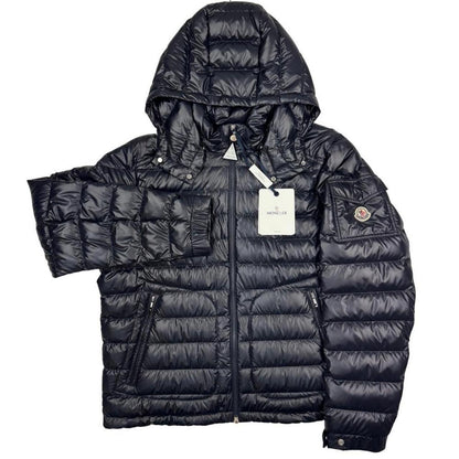 Moncler navy blue hooded puffer jacket with logo patch and nylon material.