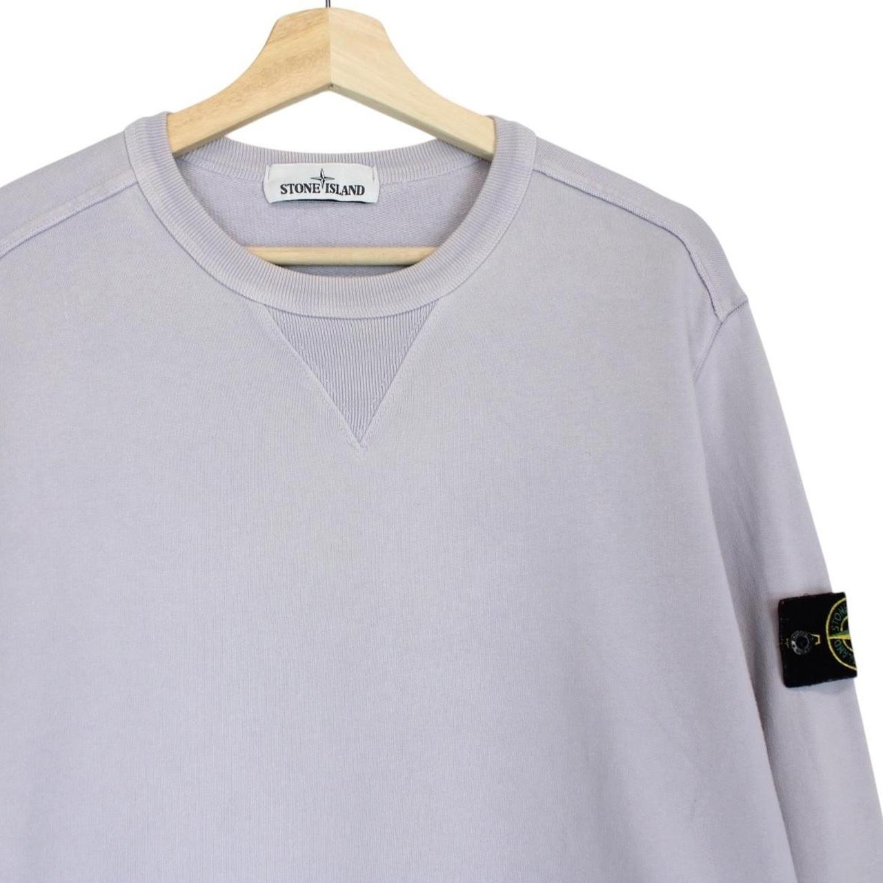 Stone Island lilac purple cotton sweatshirt with logo patch and ribbed cuffs.