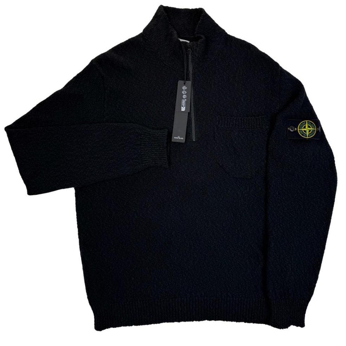 Stone Island black knit jumper with logo patch and cotton-linen blend material.
