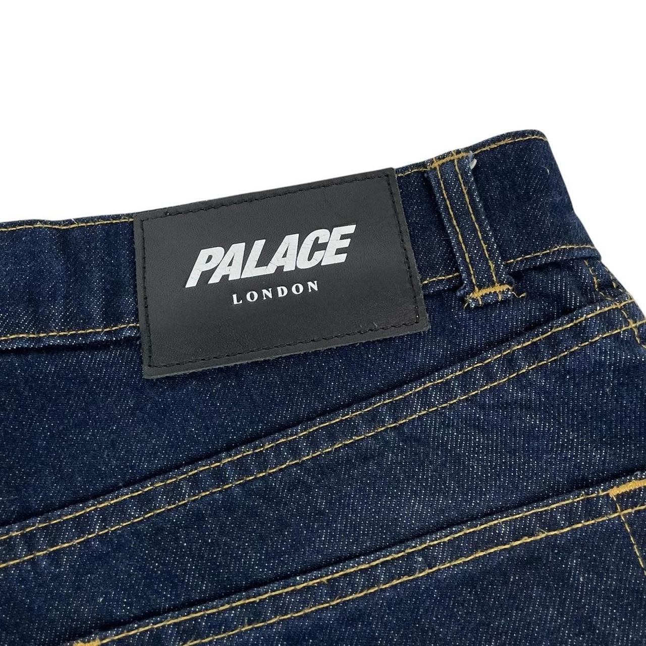 Palace straight jeans navy blue with red embroidered details and logo patch.