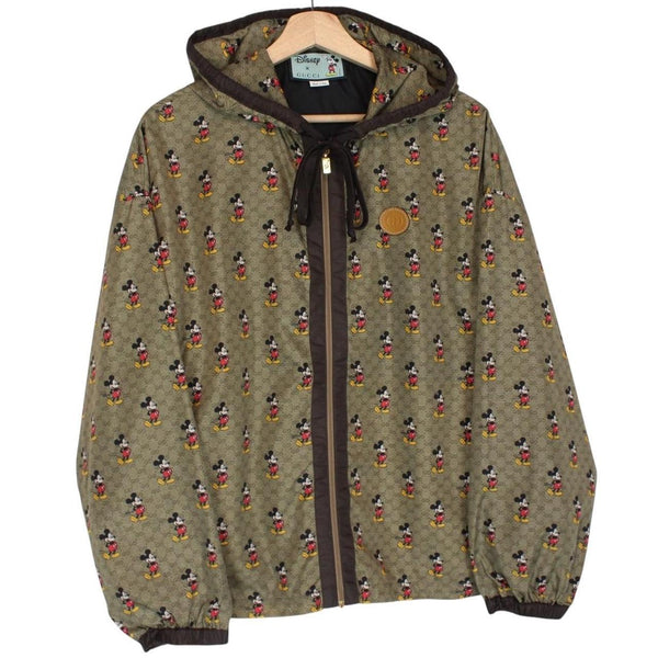 Gucci x Disney khaki brown windbreaker jacket with monogram pattern and nylon material.