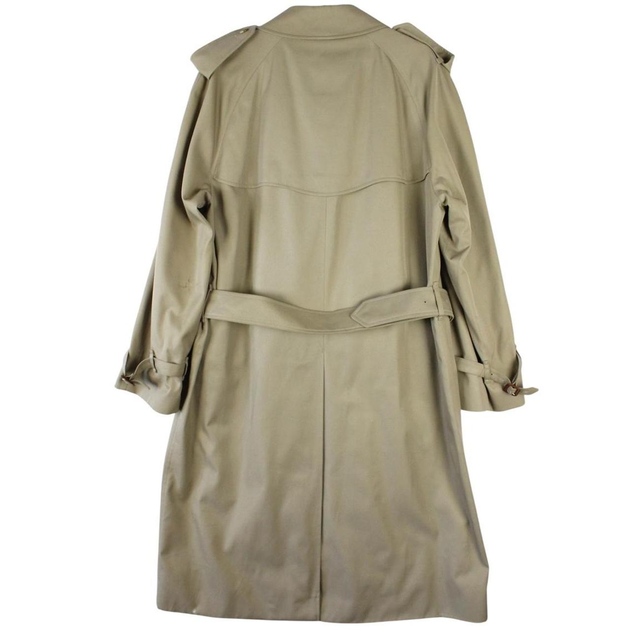 Burberry beige double-breasted belted trench coat with classic check lining and logo detail.