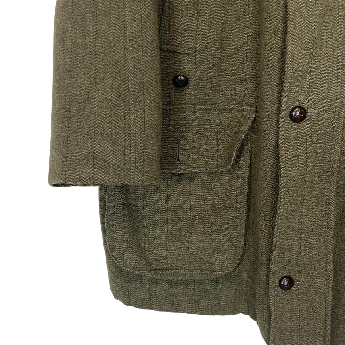 Barbour green tweed wool coat with classic pattern and missing front pocket button.