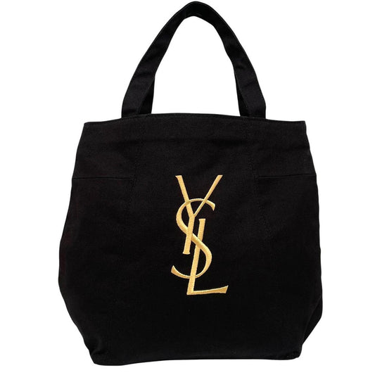 Yves Saint Laurent black duffel bag with gold embroidery and logo detail.