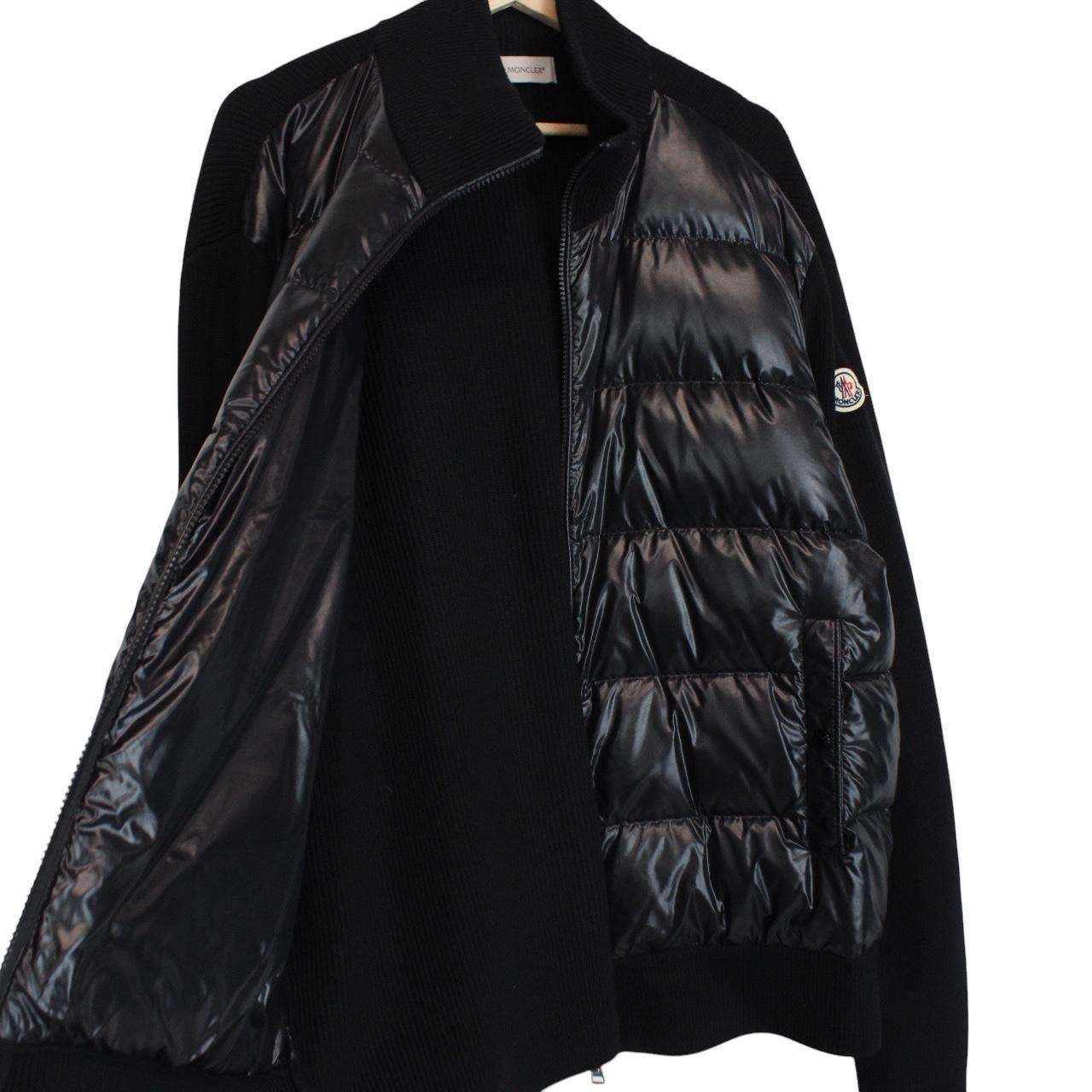 Moncler black cardigan jacket with full zip, wool/nylon blend, and logo detail.