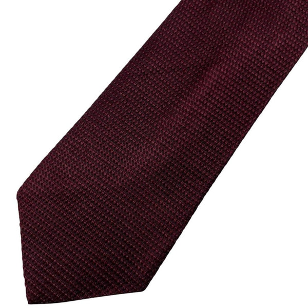 DKNY burgundy silk tie with subtle sheen and classic design.
