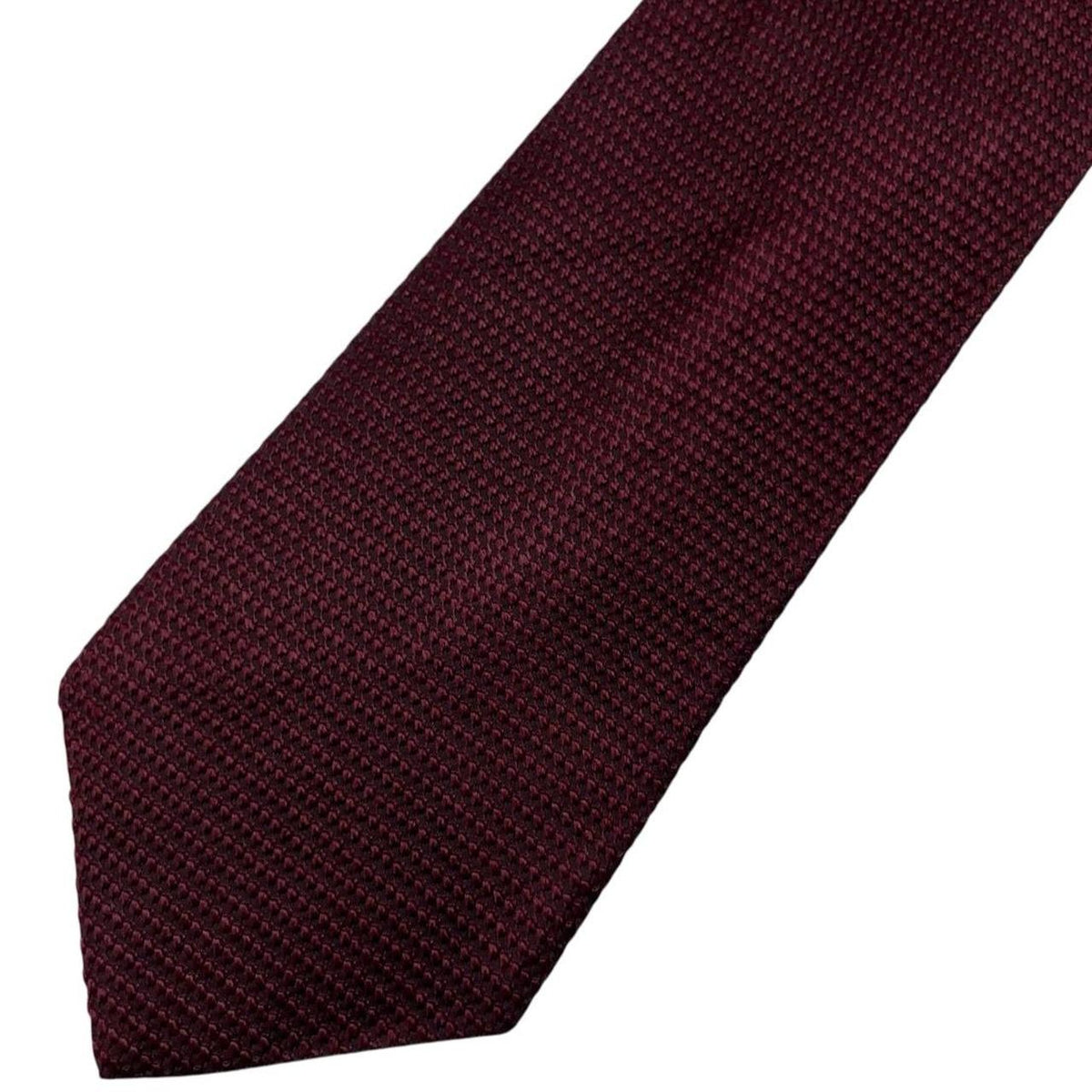 DKNY burgundy silk tie with subtle sheen and classic design.