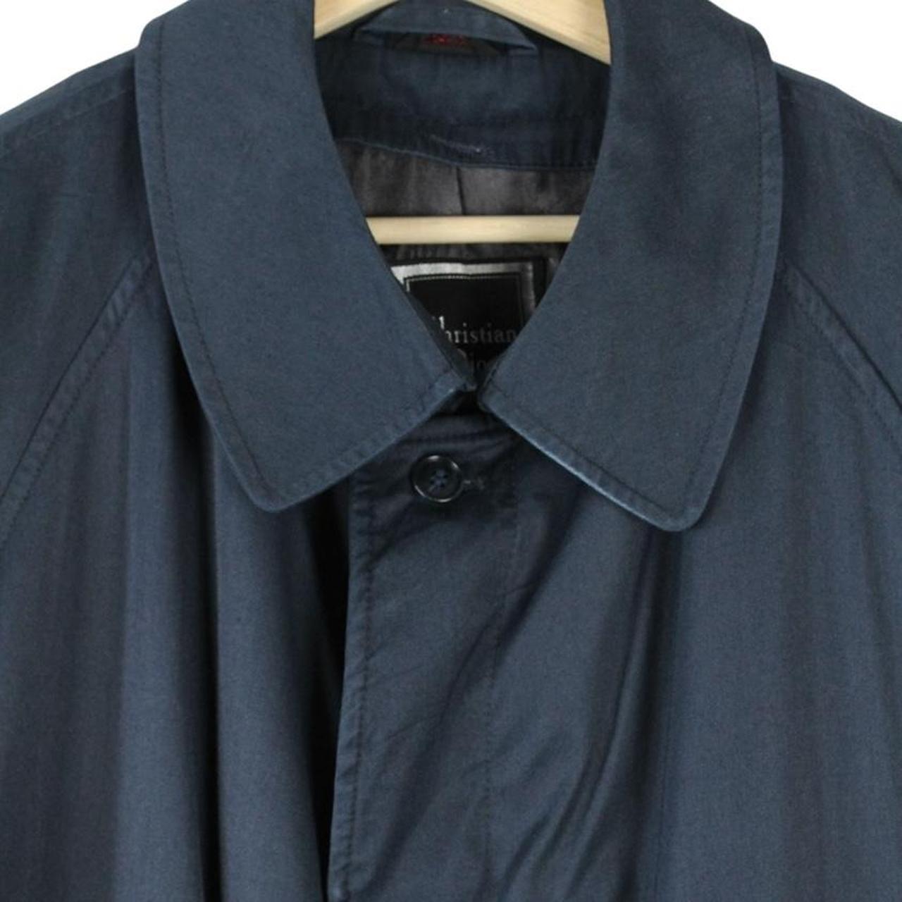 Christian Dior navy blue trench coat, single-breasted, vintage 90s style, classic design.